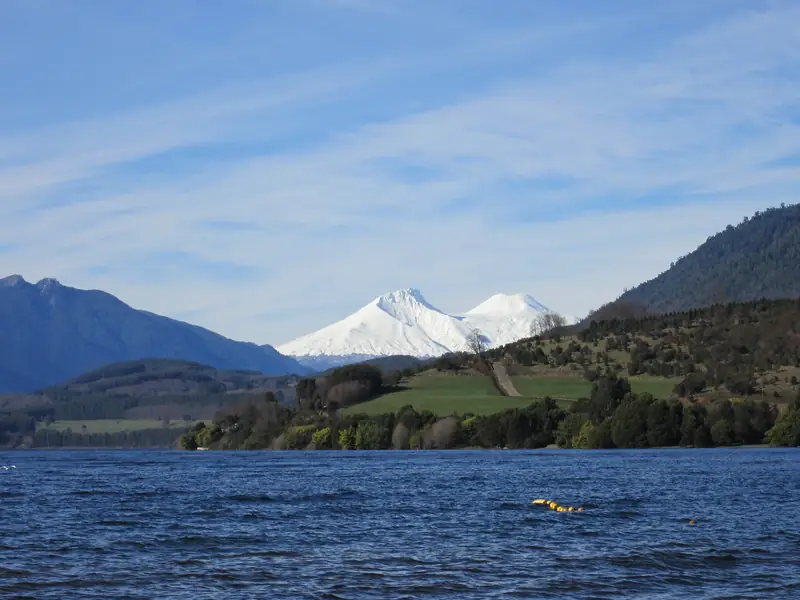 Lake Riñihue panoramic overview, Andes and Mocho-Choshuenco volcano